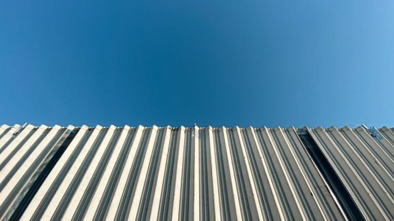 16 gauge corrugated sheet metal panels on a roof